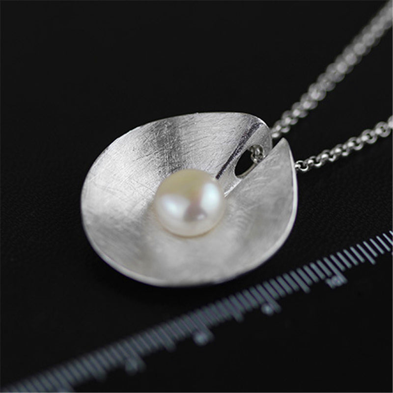 Pearl Pendant in the Shell